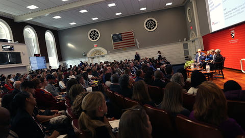people in seats in an auditorium